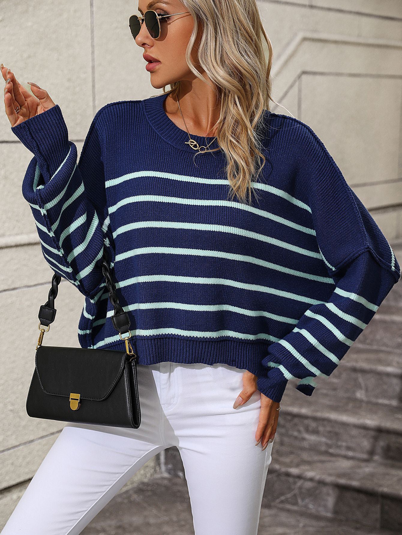 Suéter de mujer con cuello redondo europeo y americano suéter suelto a rayas